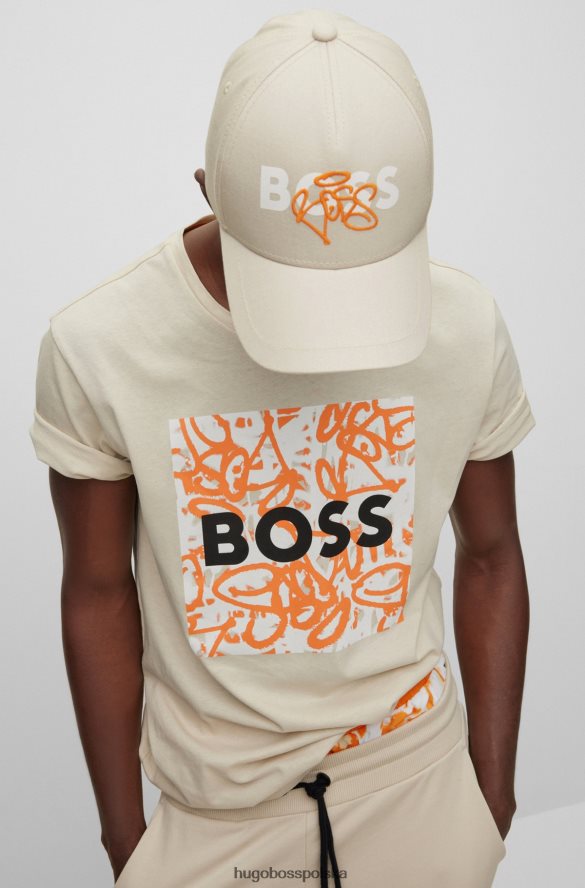 Hugo Boss Jasnobeżowa czapka hugo z logo graffiti, wykonana z bawełnianego diagonalu jasny beż R0X0H65324