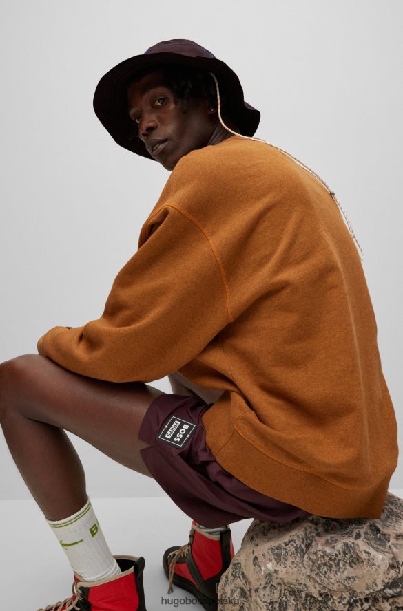 Hugo Boss x bawełniany kapelusz typu Bucket firmy phipps wykonany z przetworzonych resztek materiałów ciemno czerwony R0X0H65702