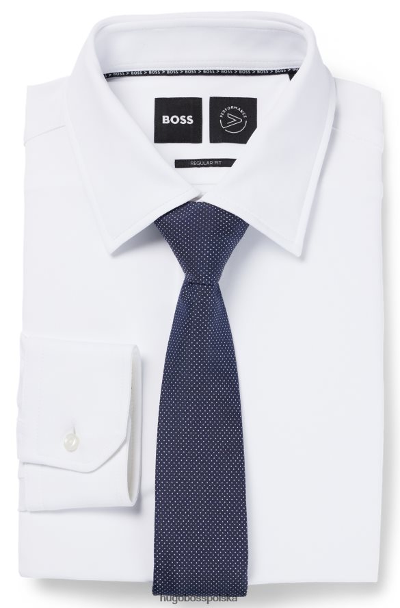Hugo Boss Ciemnoniebieski krawat hugo w drobne kropki z jedwabnego żakardu ciemny niebieski R0X0H65424