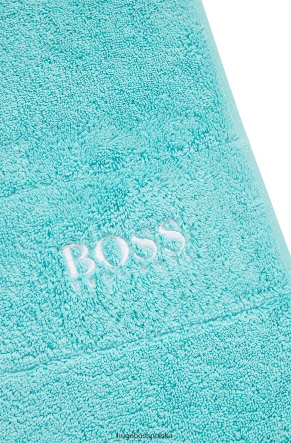 Hugo Boss Hugo turkusowa mata łazienkowa z egipskiej bawełny z kontrastowym logo turkus R0X0H65658