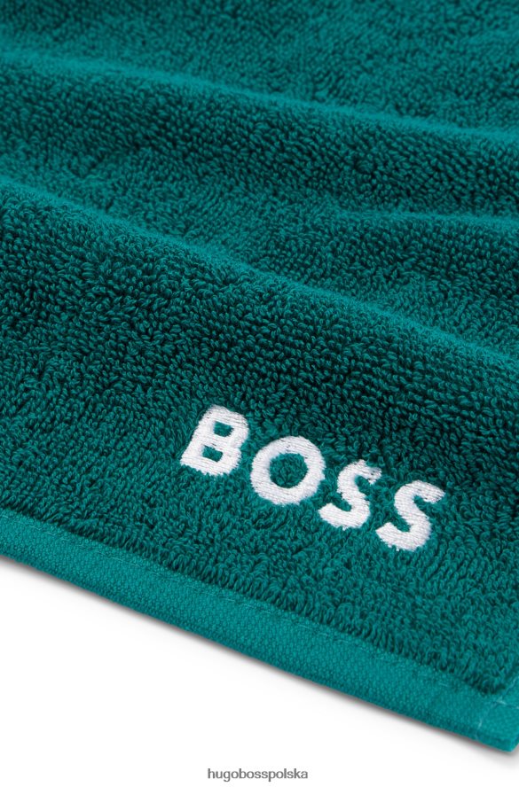 Hugo Boss ciemnozielona chusteczka do twarzy Hugo z egipskiej bawełny z kontrastowym logo ciemnozielony R0X0H65553