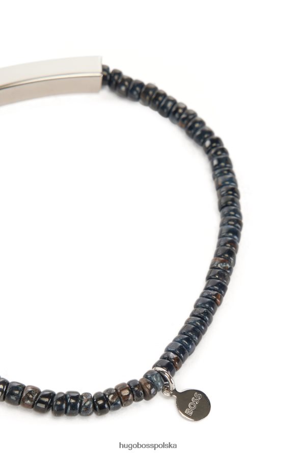 Hugo Boss mankiet w kształcie tygrysiego oka z wygrawerowanym logo paskiem hugo w kolorze ciemnoszarym ciemno szary R0X0H65334