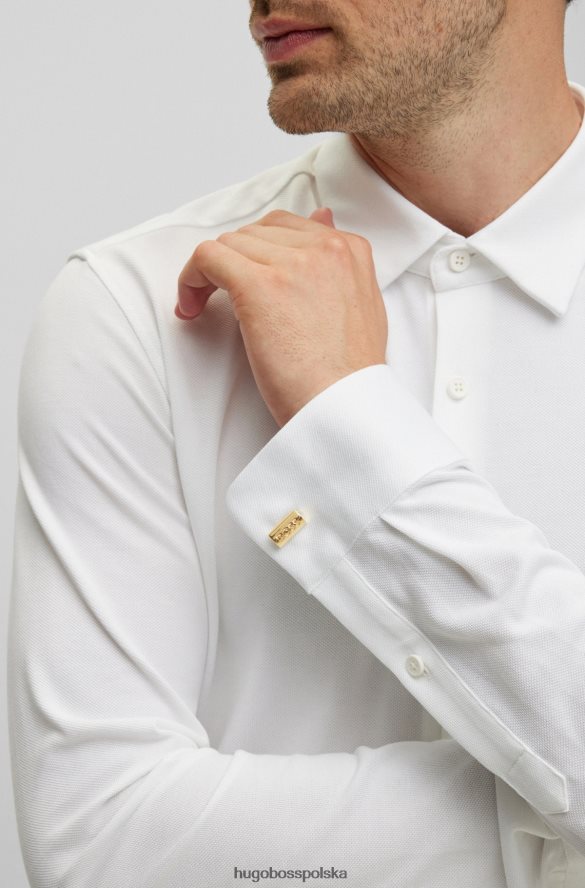 Hugo Boss Złote wypukłe spinki do mankietów z wygrawerowanym logo, ze stali hugo w kolorze złotym złoto R0X0H65875