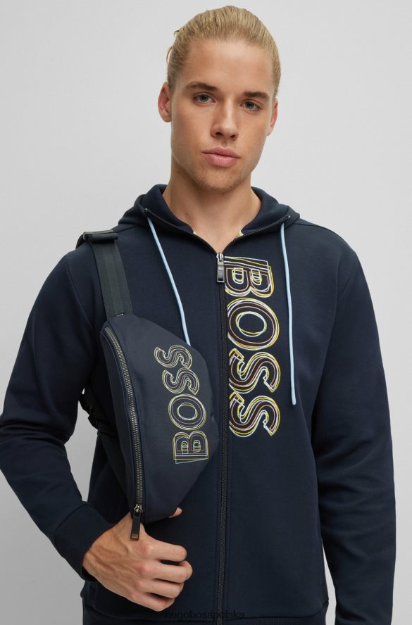 Hugo Boss ciemnoniebieska torba na pasek z nylonu pochodzącego z recyklingu z warstwowym nadrukiem logo hugo ciemny niebieski R0X0H65509