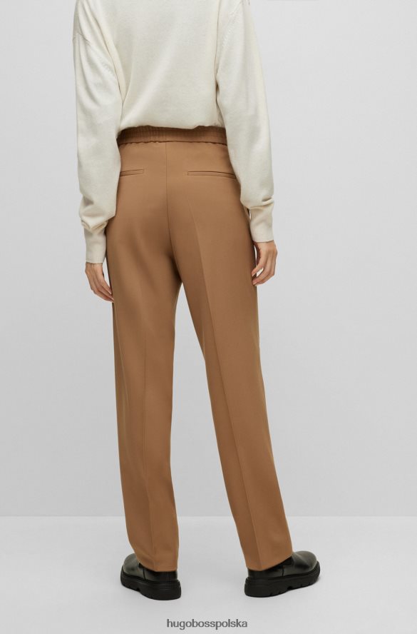Hugo Boss beżowe wizytowe spodnie unisex hugo z dziewiczej wełny beżowy R0X0H63505