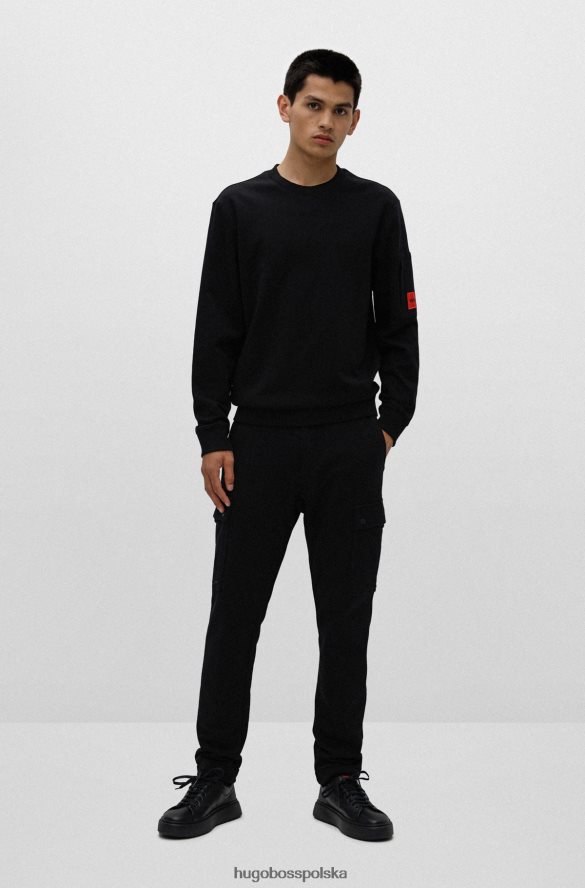 Hugo Boss Buty sportowe z mieszanki skóry z markową naszywką na plecach Hugo w kolorze czarnym czarny R0X0H64794