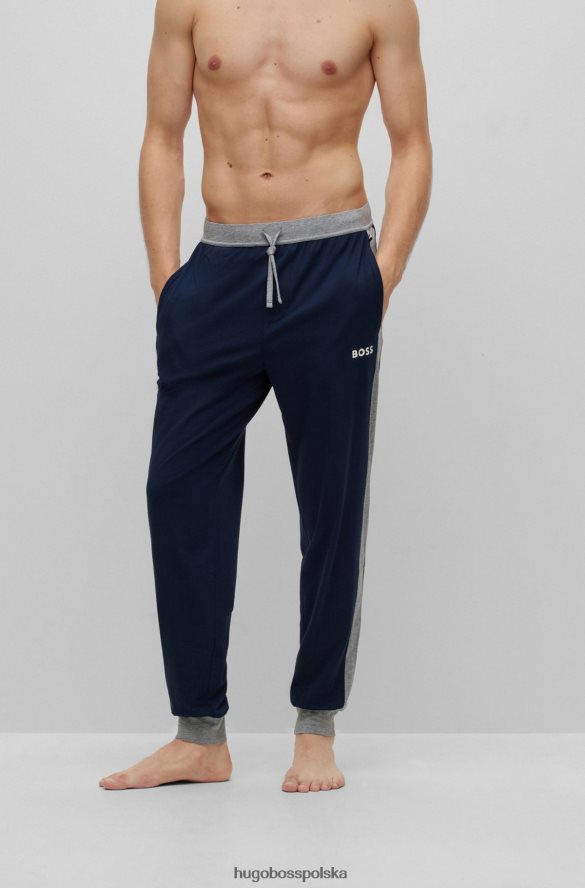 Hugo Boss Ciemnoniebieskie spodnie od piżamy Hugo z elastycznego materiału z kontrastowymi detalami ciemny niebieski R0X0H62435