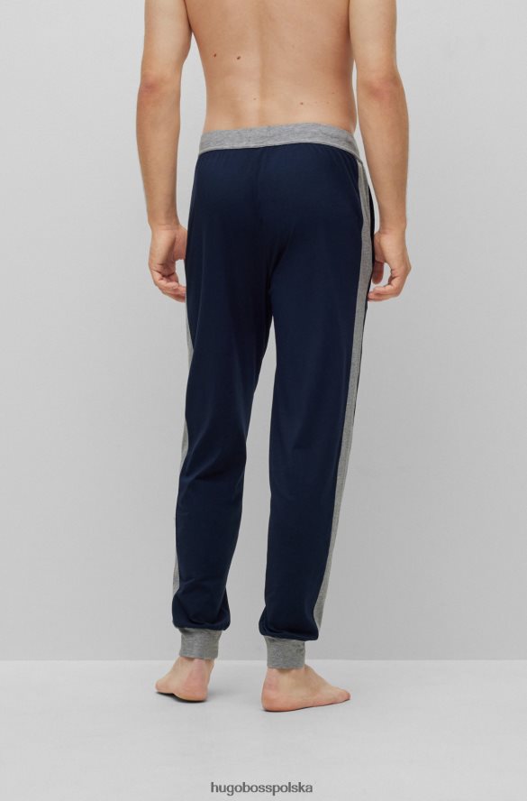 Hugo Boss Ciemnoniebieskie spodnie od piżamy Hugo z elastycznego materiału z kontrastowymi detalami ciemny niebieski R0X0H62435