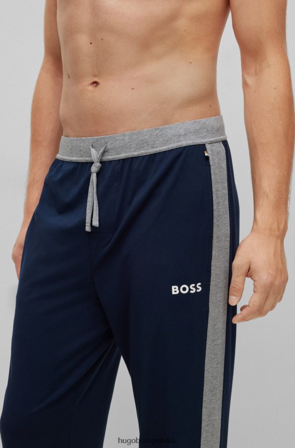 Hugo Boss Ciemnoniebieskie spodnie od piżamy Hugo z elastycznego materiału z kontrastowymi detalami ciemny niebieski R0X0H62435