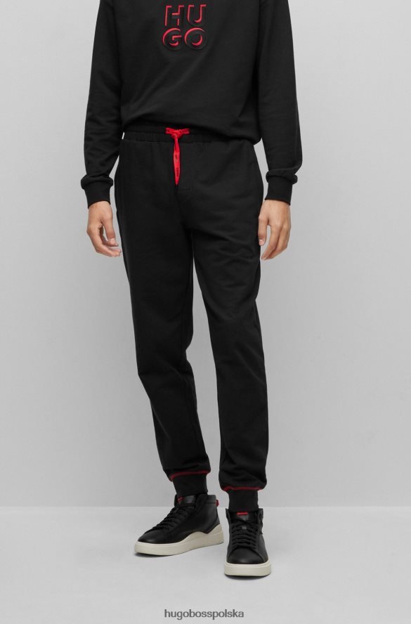 Hugo Boss Czarne spodnie dresowe hugo z bawełny frotte i logo nakładanym na siebie czarny R0X0H62474