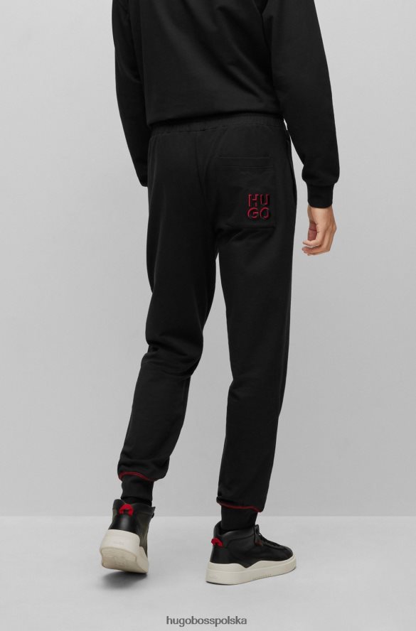 Hugo Boss Czarne spodnie dresowe hugo z bawełny frotte i logo nakładanym na siebie czarny R0X0H62474