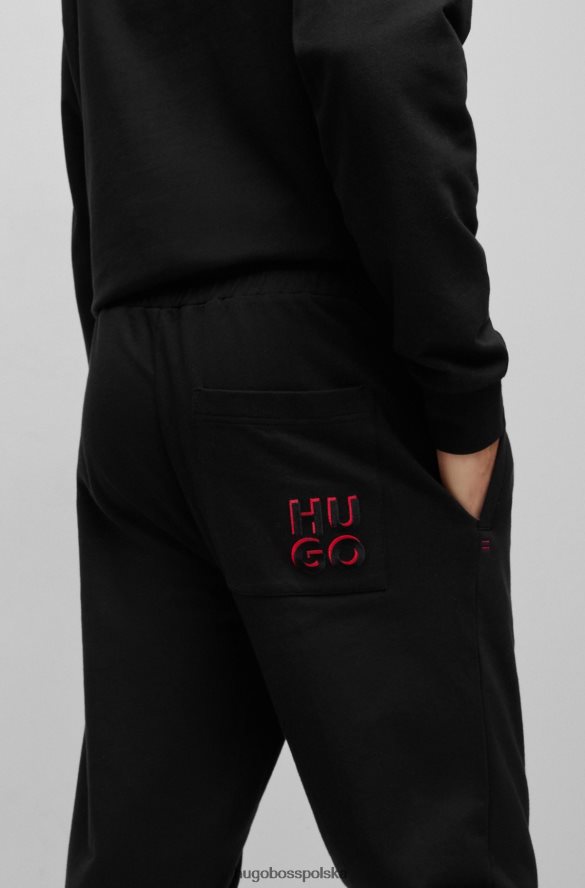 Hugo Boss Czarne spodnie dresowe hugo z bawełny frotte i logo nakładanym na siebie czarny R0X0H62474