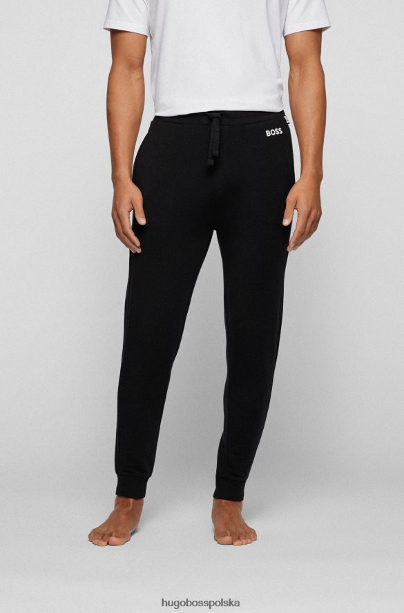 Hugo Boss Czarne spodnie dresowe z blokami kolorów i kontrastowym logo hugo czarny R0X0H64622