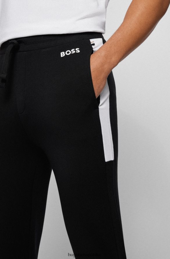 Hugo Boss Czarne spodnie dresowe z blokami kolorów i kontrastowym logo hugo czarny R0X0H64622
