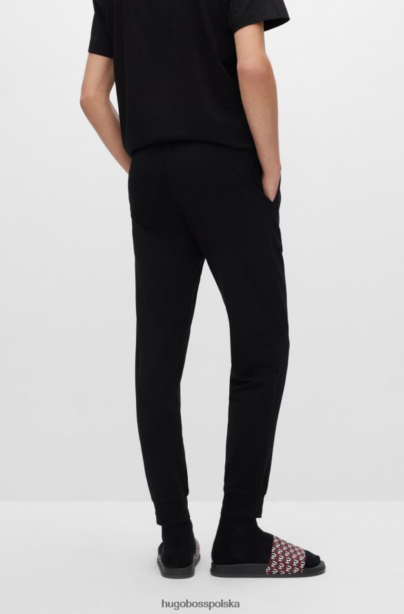 Hugo Boss Czarne spodnie od piżamy Hugo z elastycznej bawełny z logo w pasie czarny R0X0H64299