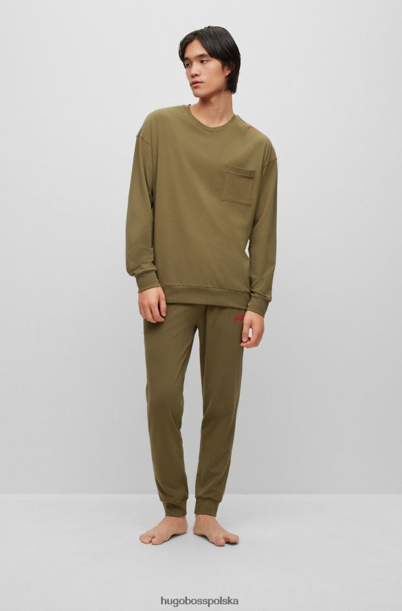 Hugo Boss Jasnozielone spodnie dresowe z elastycznej bawełny z czerwonym logo hugo jasnozielony R0X0H64402