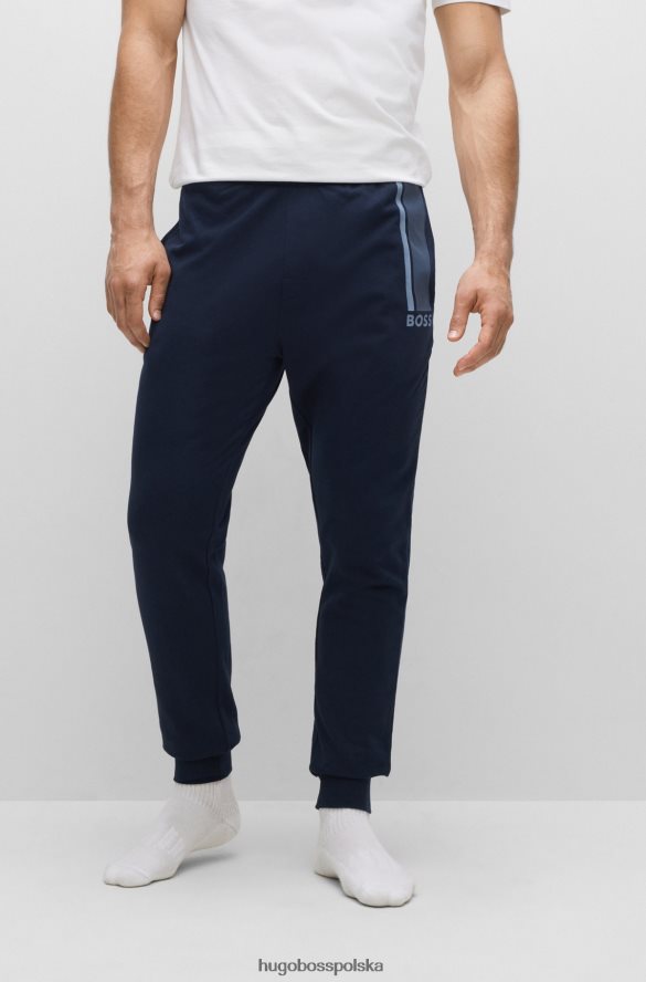 Hugo Boss Spodnie dresowe hugo z bawełny frotte z logo i paskami w kolorze ciemnoniebieskim ciemny niebieski R0X0H62672