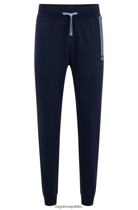 Hugo Boss Spodnie dresowe hugo z bawełny frotte z logo i paskami w kolorze ciemnoniebieskim ciemny niebieski R0X0H62672