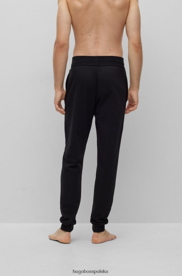 Hugo Boss Spodnie dresowe z bawełny frotte w paski w kropki i czarne logo hugo czarny R0X0H63261