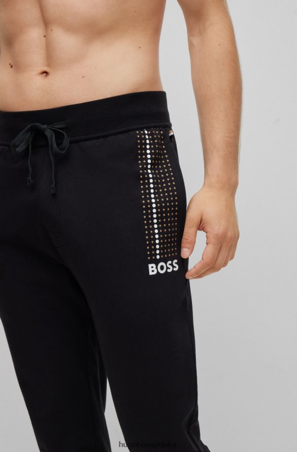 Hugo Boss Spodnie dresowe z bawełny frotte w paski w kropki i czarne logo hugo czarny R0X0H63261