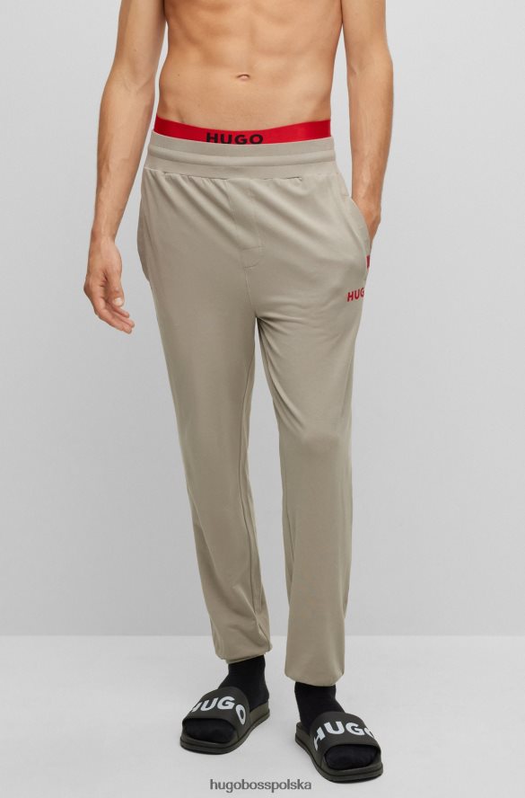 Hugo Boss Spodnie dresowe z elastycznej bawełny z czerwonym logo w kolorze jasnozielonym hugo jasnozielony R0X0H64401