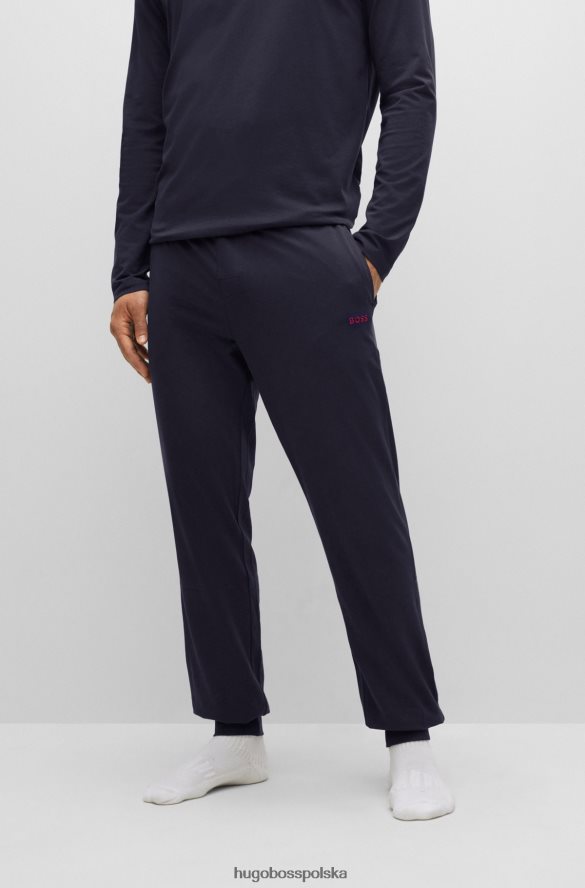 Hugo Boss Spodnie dresowe z rozciągliwej bawełny z haftowanym logo Hugo w kolorze granatowym ciemny niebieski R0X0H62383