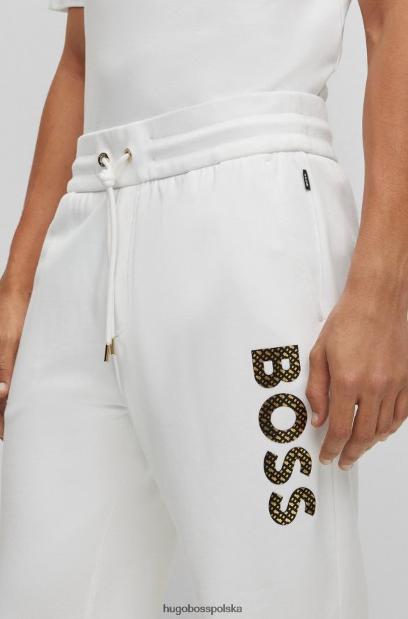 Hugo Boss Białe spodnie dresowe hugo z bawełny frotte i logo wypełnionym monogramami biały R0X0H62635
