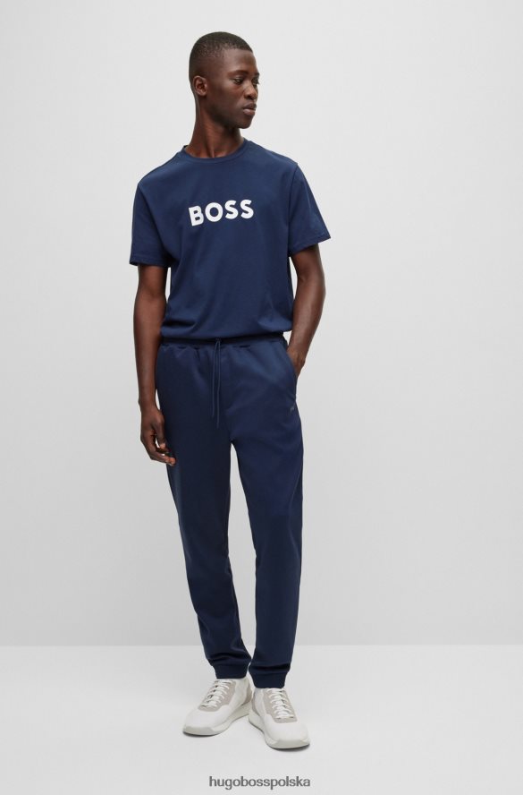 Hugo Boss Ciemnoniebieskie bawełniane spodnie dresowe z zakrzywionym logo hugo ciemny niebieski R0X0H62533
