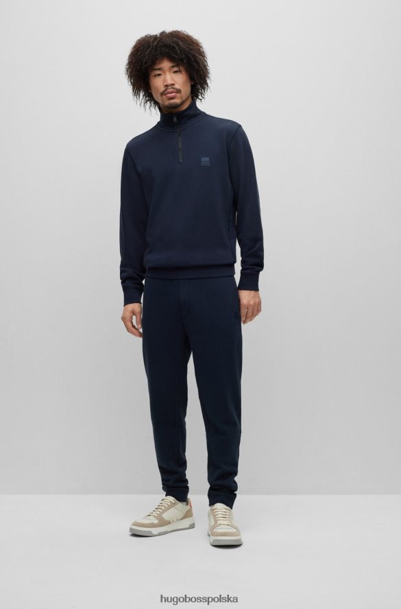 Hugo Boss Ciemnoniebieskie spodnie dresowe hugo z bawełny frotte i naszywką z logo ciemny niebieski R0X0H61436