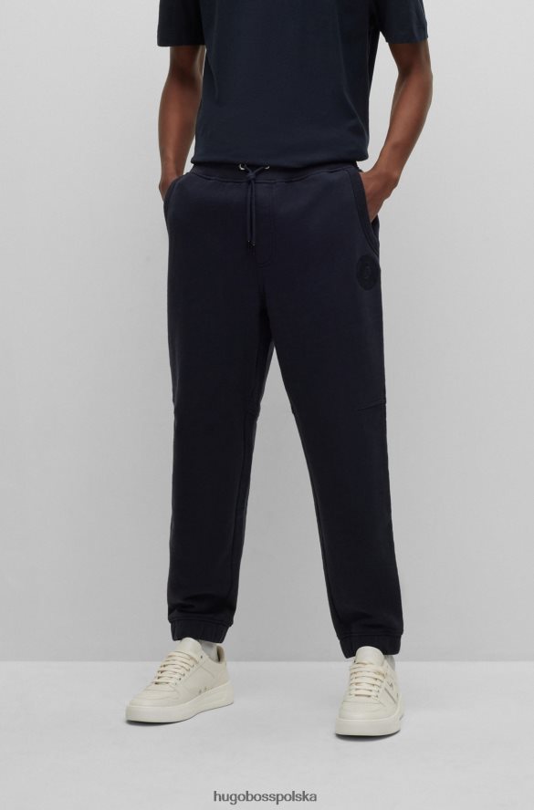 Hugo Boss Ciemnoniebieskie spodnie dresowe z mieszanki bawełny z haftowanym logo hugo ciemny niebieski R0X0H64111