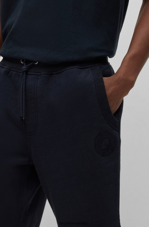 Hugo Boss Ciemnoniebieskie spodnie dresowe z mieszanki bawełny z haftowanym logo hugo ciemny niebieski R0X0H64111