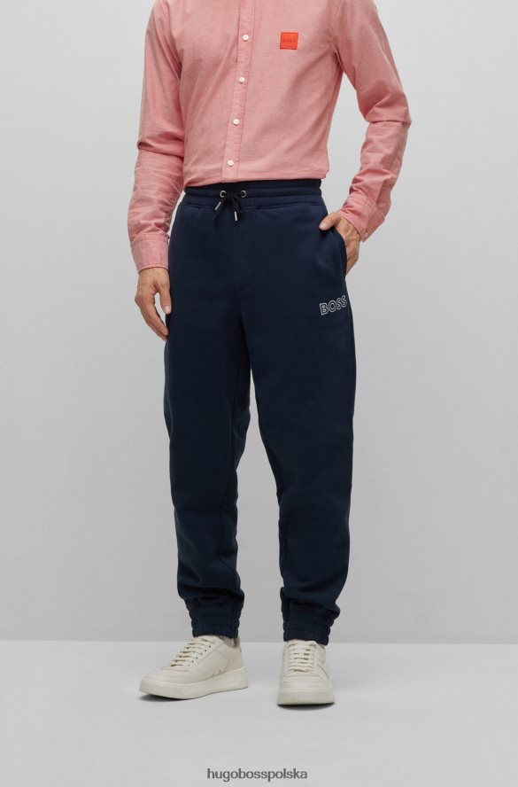Hugo Boss Ciemnoniebieskie spodnie dresowe z mieszanki bawełny z kontrastowym logo hugo ciemny niebieski R0X0H64147