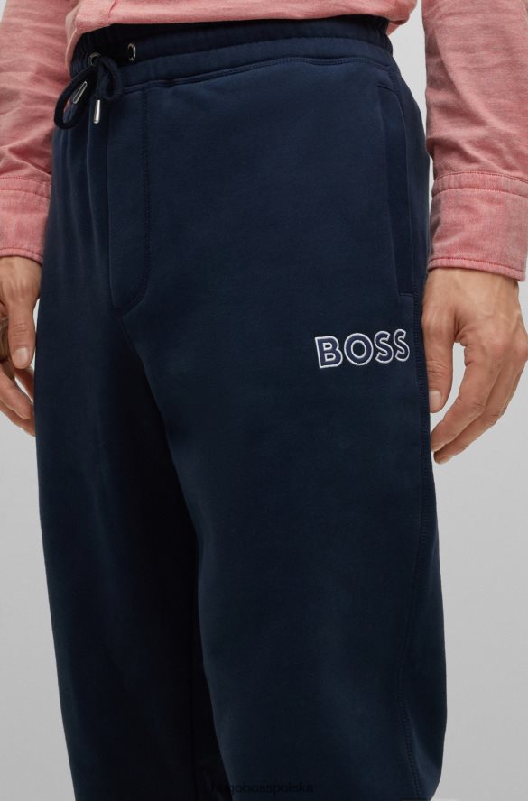 Hugo Boss Ciemnoniebieskie spodnie dresowe z mieszanki bawełny z kontrastowym logo hugo ciemny niebieski R0X0H64147