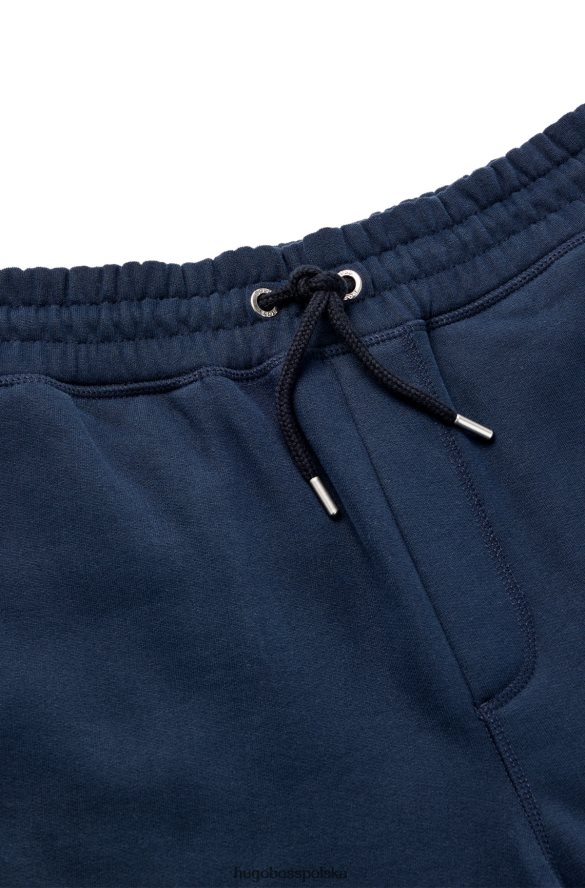 Hugo Boss Ciemnoniebieskie spodnie dresowe z mieszanki bawełny z kontrastowym logo hugo ciemny niebieski R0X0H64147
