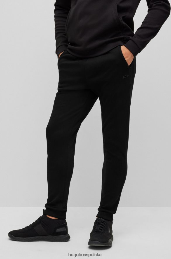 Hugo Boss Czarne bawełniane spodnie dresowe Hugo z zakrzywionym logo czarny R0X0H62536