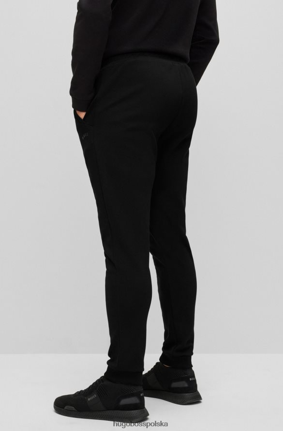 Hugo Boss Czarne bawełniane spodnie dresowe Hugo z zakrzywionym logo czarny R0X0H62536
