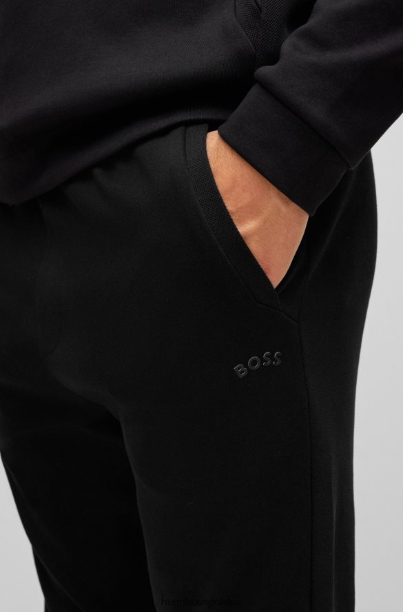 Hugo Boss Czarne bawełniane spodnie dresowe Hugo z zakrzywionym logo czarny R0X0H62536