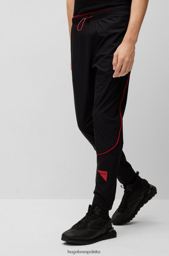 Hugo Boss Czarne spodnie dresowe Hugo o regularnym kroju z lamówką i logo kapsuły czarny R0X0H63732