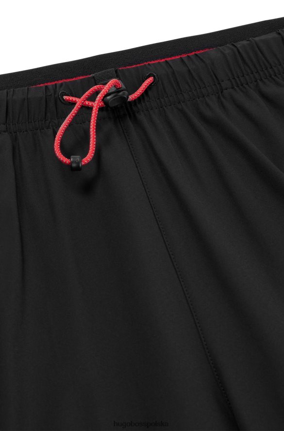 Hugo Boss Czarne spodnie dresowe Hugo o regularnym kroju z lamówką i logo kapsuły czarny R0X0H63732