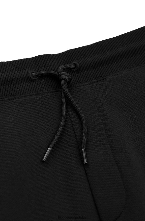 Hugo Boss Czarne spodnie dresowe hugo z bawełny frotte i logo z nadrukiem foliowym czarny R0X0H64109
