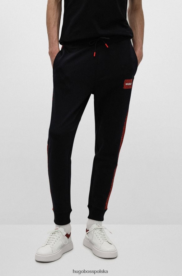 Hugo Boss Czarne spodnie dresowe hugo z bawełny frotte, z naszywką z logo i wstawkami czarny R0X0H62573