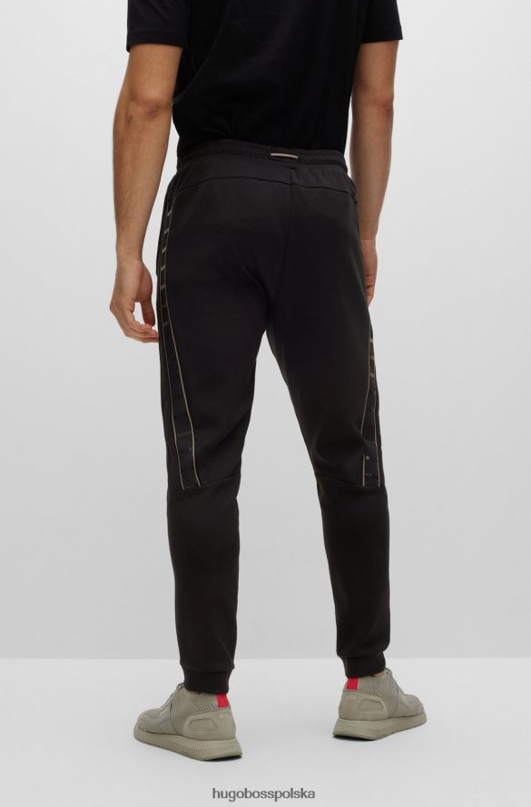 Hugo Boss Czarne spodnie dresowe hugo z mieszanki bawełny, ze wstawkami z taśmy z logo czarny R0X0H61287