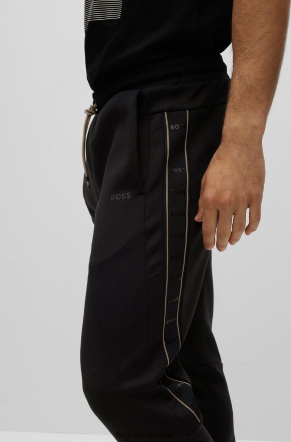 Hugo Boss Czarne spodnie dresowe hugo z mieszanki bawełny, ze wstawkami z taśmy z logo czarny R0X0H61287