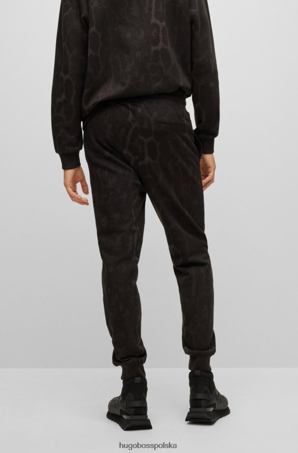 Hugo Boss Czarne spodnie dresowe w kształcie jagliona, wykonane z bawełny hugo z frotte czarny R0X0H64328