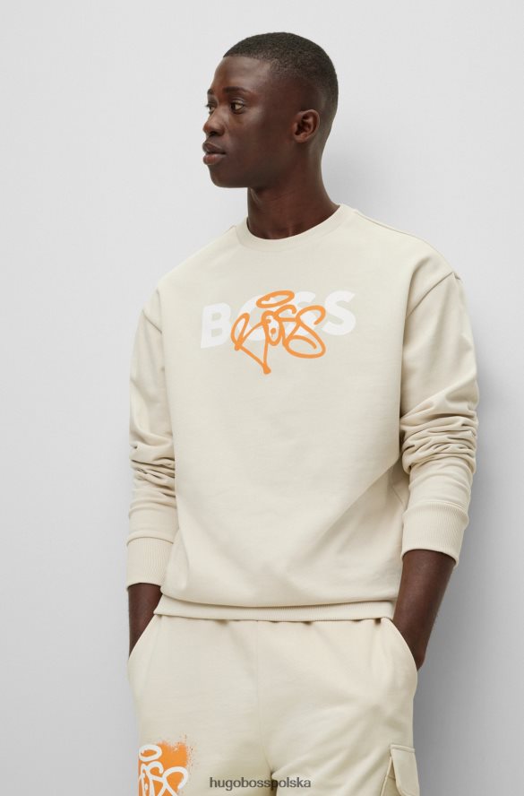 Hugo Boss Hugo bawełniana bluza o swobodnym kroju z grafiką z graffiti w kolorze jasnobeżowym jasny beż R0X0H61532