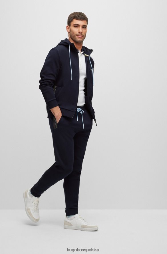 Hugo Boss Hugo ciemnoniebieskie spodnie dresowe z mieszanki bawełny z detalami w wielokolorowe paski ciemny niebieski R0X0H61732