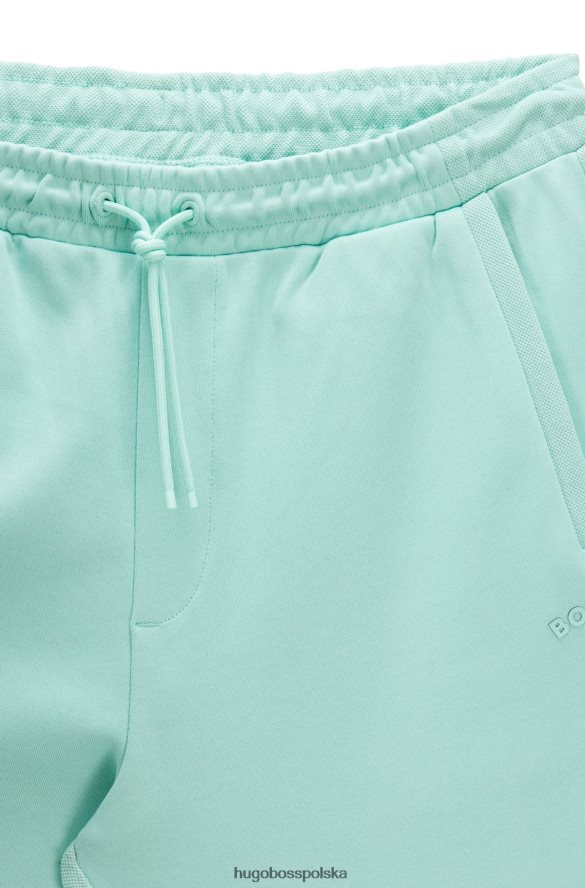 Hugo Boss Jasnozielone, bawełniane spodnie dresowe Hugo z zaokrąglonym logo jasnozielony R0X0H62535