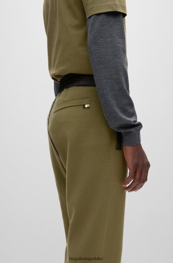 Hugo Boss Jasnozielone spodnie dresowe Hugo o regularnym kroju, wykonane z bawełny i dziewiczej wełny jasnozielony R0X0H62867