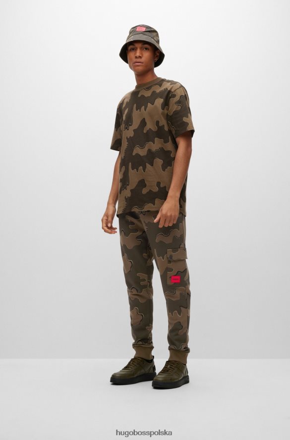 Hugo Boss Spodnie dresowe hugo cargo z bawełny z nadrukiem w kamuflaż w kolorze zielonym zielone wzorzyste R0X0H62537