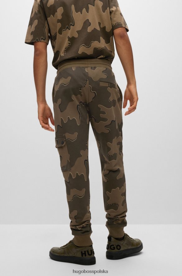 Hugo Boss Spodnie dresowe hugo cargo z bawełny z nadrukiem w kamuflaż w kolorze zielonym zielone wzorzyste R0X0H62537